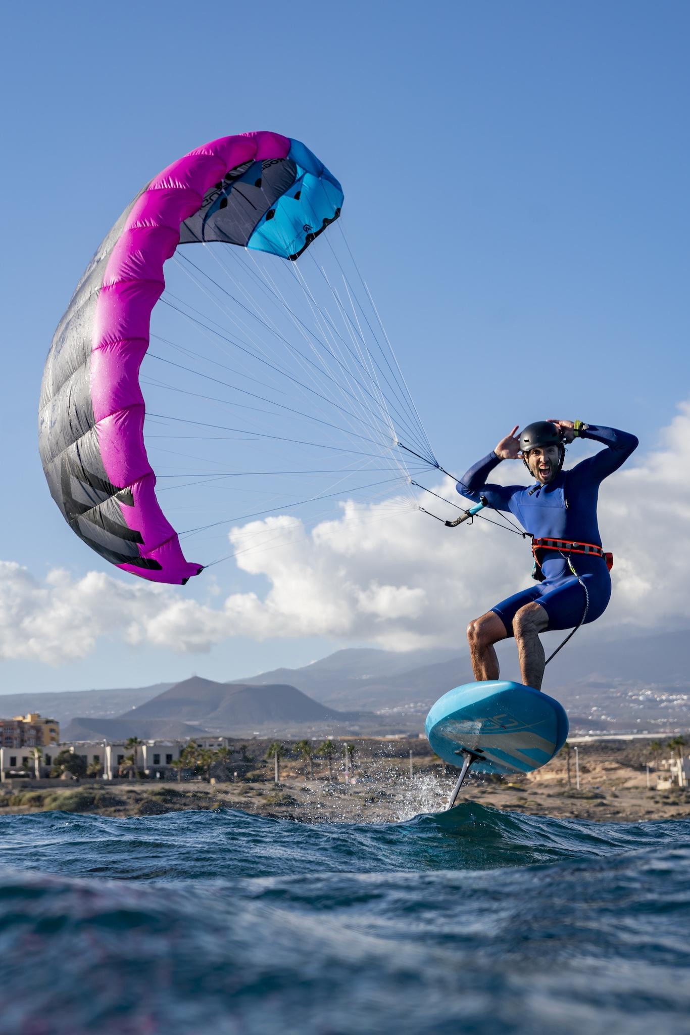 Ensis Roger rider foiling hands-free, demonstrating the harness-based riding style