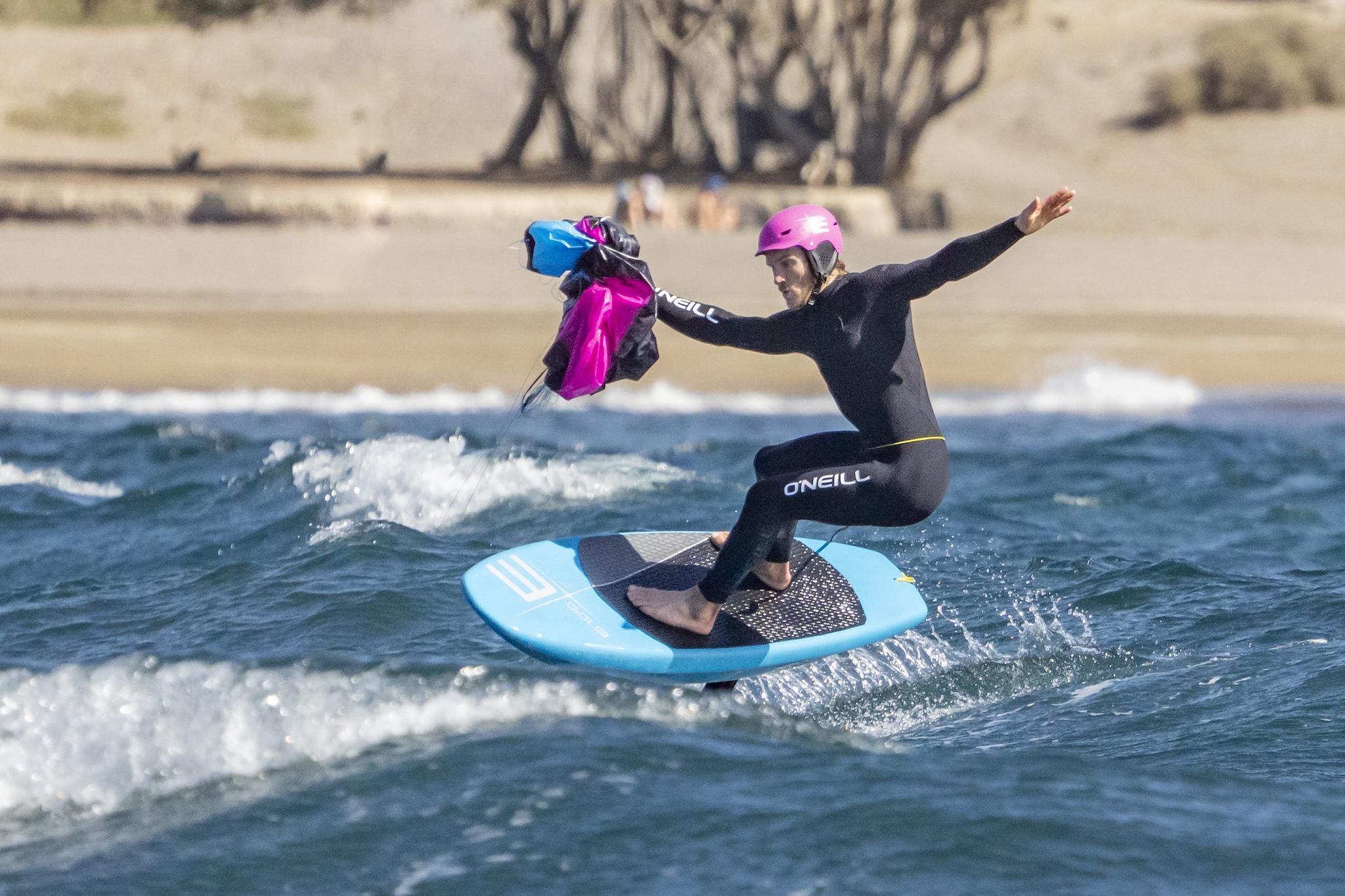 Ensis Roger rider performing a cutback on a small wave