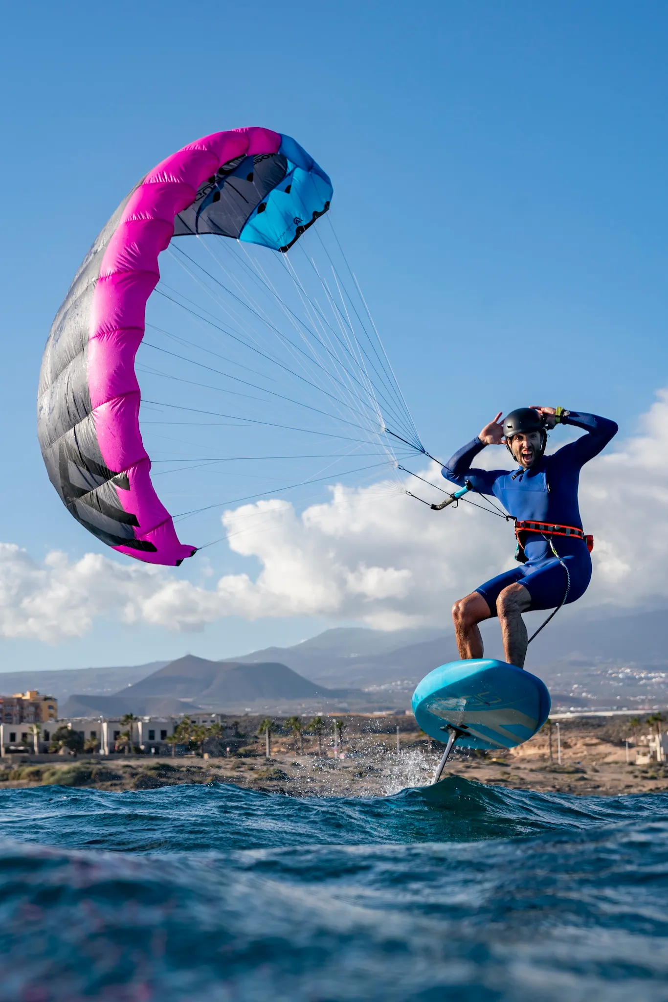 Ensis Roger rider foiling hands-free, demonstrating the harness-based riding style