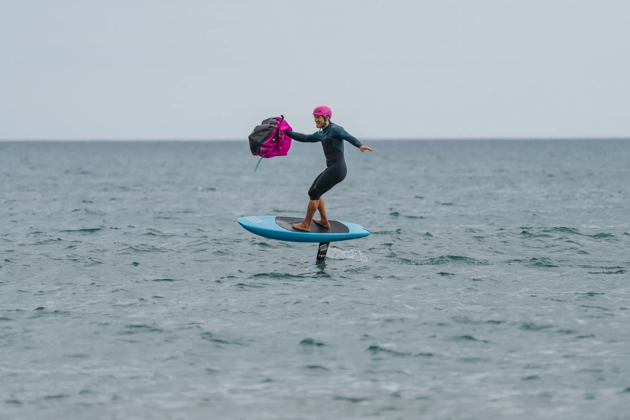 Ensis Roger rider carving through turquoise waves