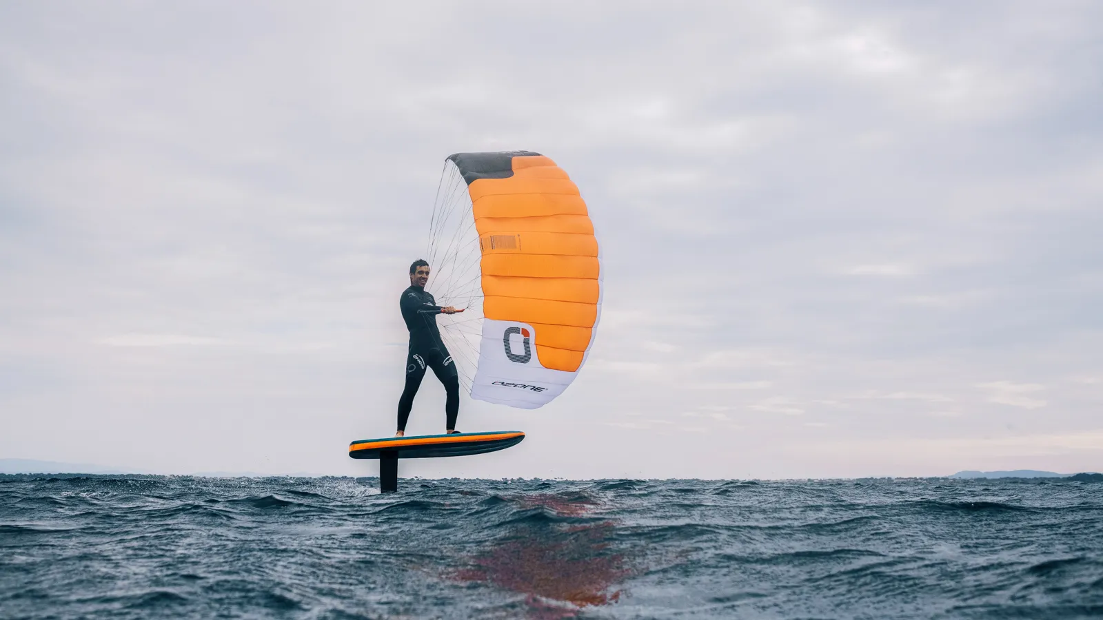 Ozone Pocket Rocket clean side view showing the full parawingfoiling setup in action