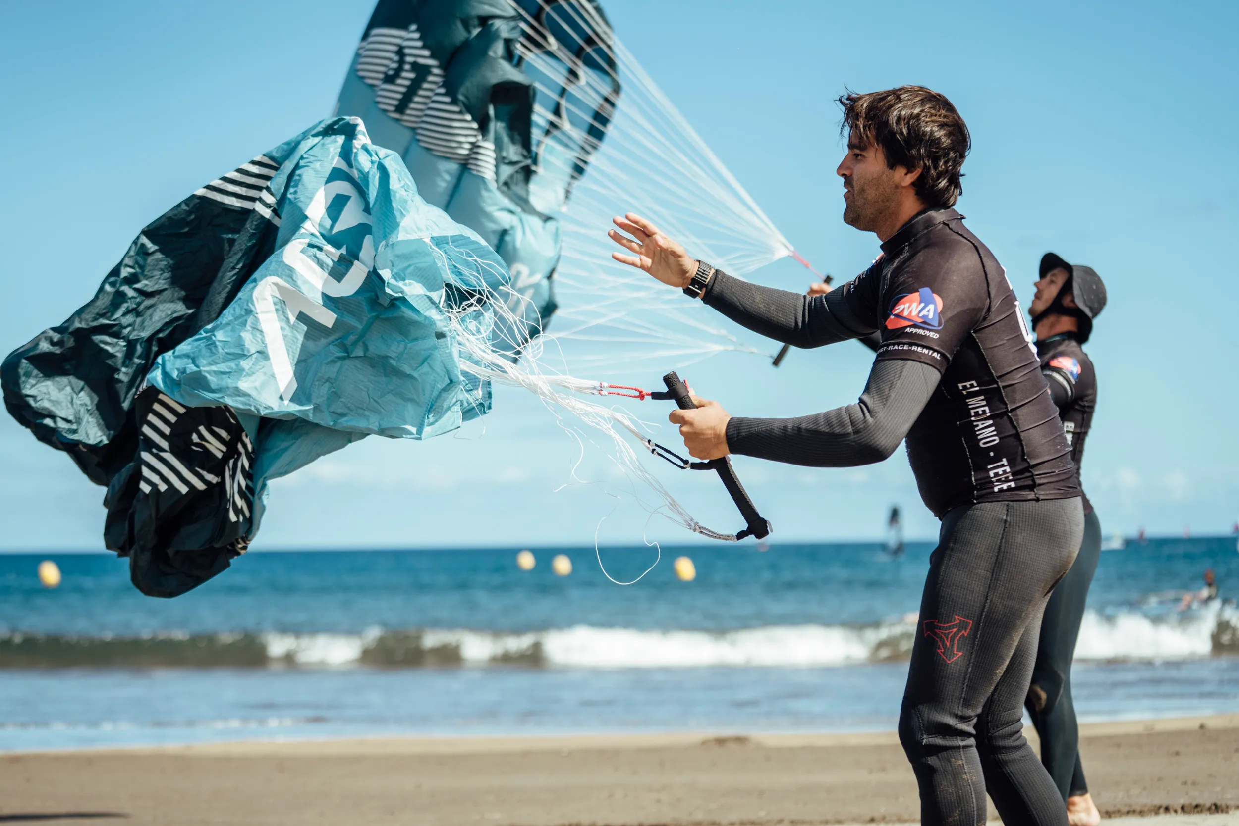 Close-up of a parawing and hydrofoil board setup for a gear guide